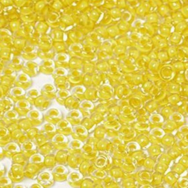 Бісер Чеський №38481Прозорий з жовтим внутрішнім забарвленням