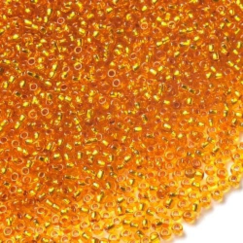 Бісер Чеський № 87060 Прозорий помаранчевий зі срібною круглою серединкою